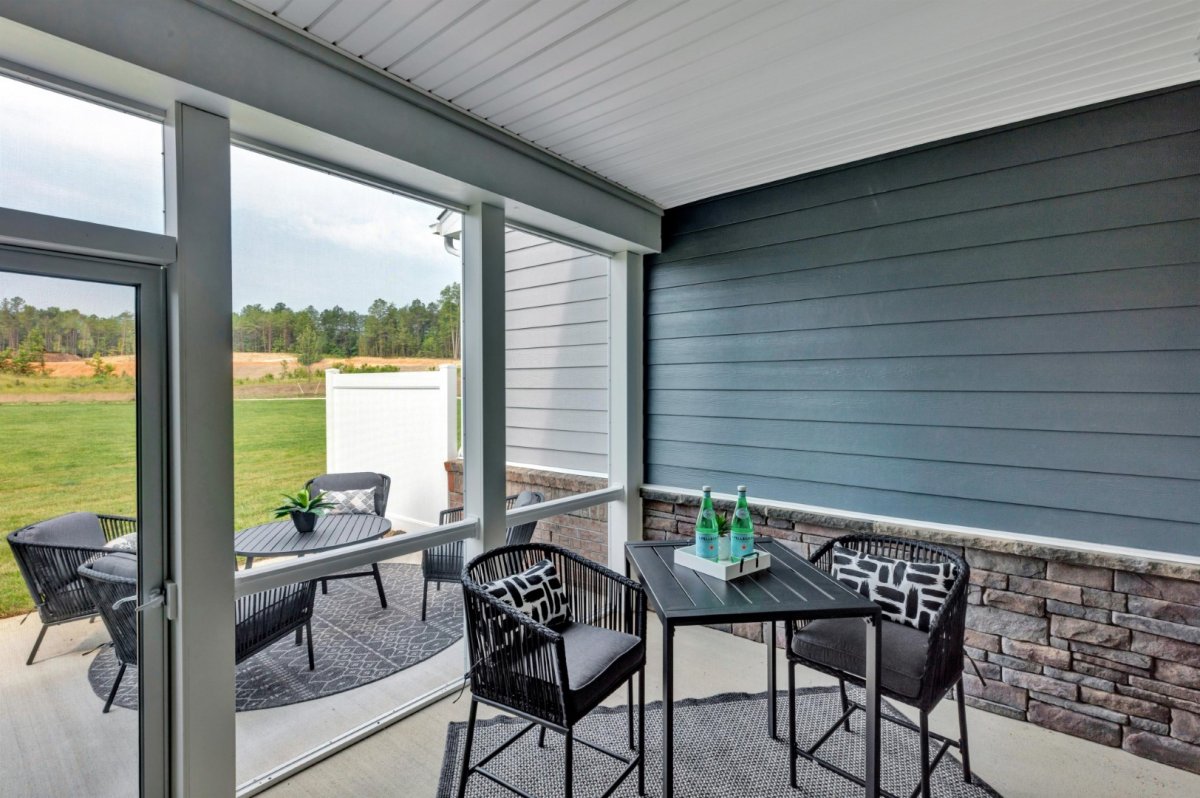 Relaxing screened-in porch with seating