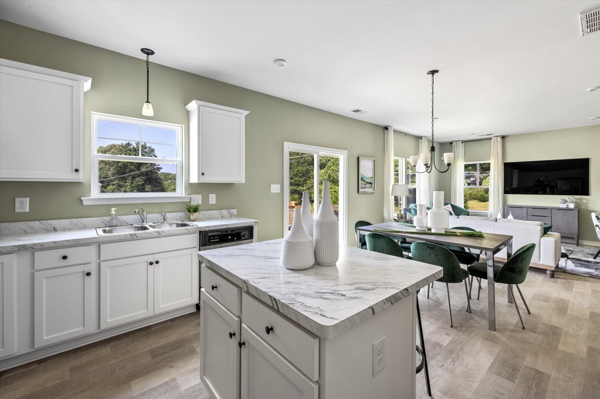 Kitchen and dining area at Central Crossing by HHHunt