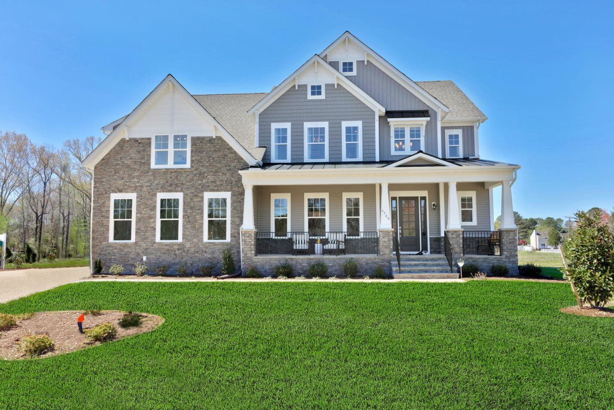 Exterior of the Buckingham floor plan, Bungalow A elevation, by HHHunt Homes at The Summit At Morgan Ridge featuring mixed stone and horizontal siding, board and batten accents, a large covered front porch with tapered columns, black metal porch railings,