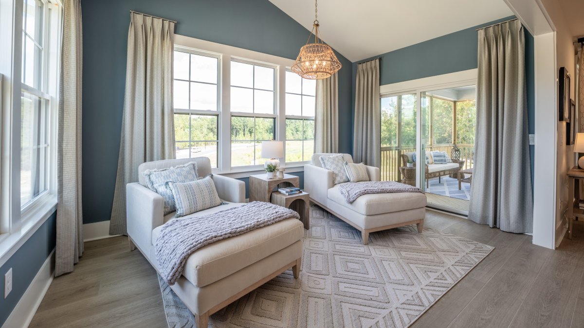 Morning room in the Chatham floor plan at Tyson's Trail Estates by HHHunt Homes, featuring tons of natural light and access to a screened porch.